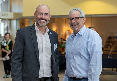 From left: St. Petersburg College Board Chair Jason Butts and Mike Carroll