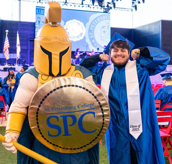 smiling SPC graduate with Titus