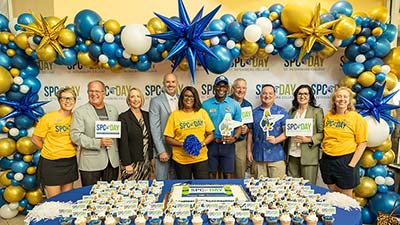 group shot of SPC board of trustees members and foundation partners