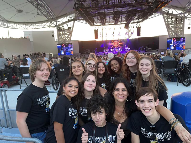 SPCHS chorus studens with foreigner