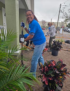 spc employee working on a habitat for humanity house