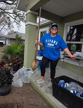 Samantha Stanich in a blue t shirt working