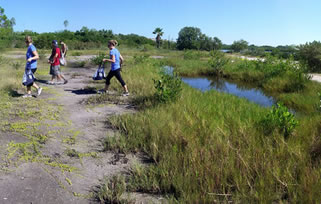 students gathering samples outside of SPC Bay Pines STEM Center