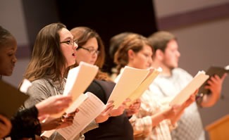 community chorus rehearsing