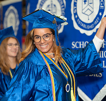 Female graduate in cap and gown