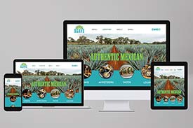Student digital media project of a website for a hypothetical Mexican restaurant called Agave. Homepage of the website is shown in different views on four devices: a desktop computer, a laptop, a tablet, and a smartphone. The homepage features a field of agave plants with a blue bar below with buttons for drinks, appetizers, tacos, and the lounge.