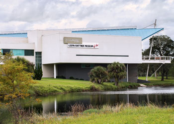 LRMA exterior photo with pond in the foreground