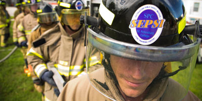 SPC first responder students wearing firefighter gear