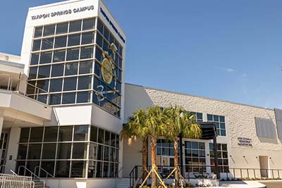 The SPC Tarpon Springs Campus Chris Sprowls Workforce Innovation Hub building, beneath a blue sky.