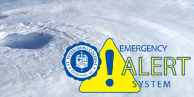 satellite photo of a hurricane with the SPC seal and the words Emergency Alert System