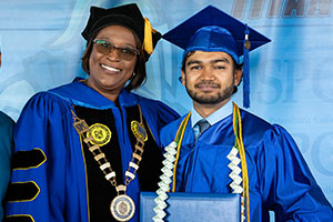 graduate photo with Dr. Williams